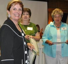 Jan Tyler-Blanchard wins a top flower show award.